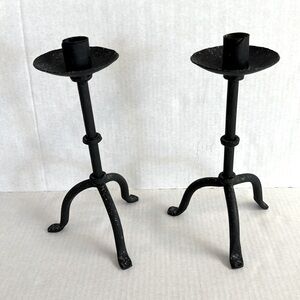 Vtg Pair of handmade brutalist rustic black footed iron candle holders.